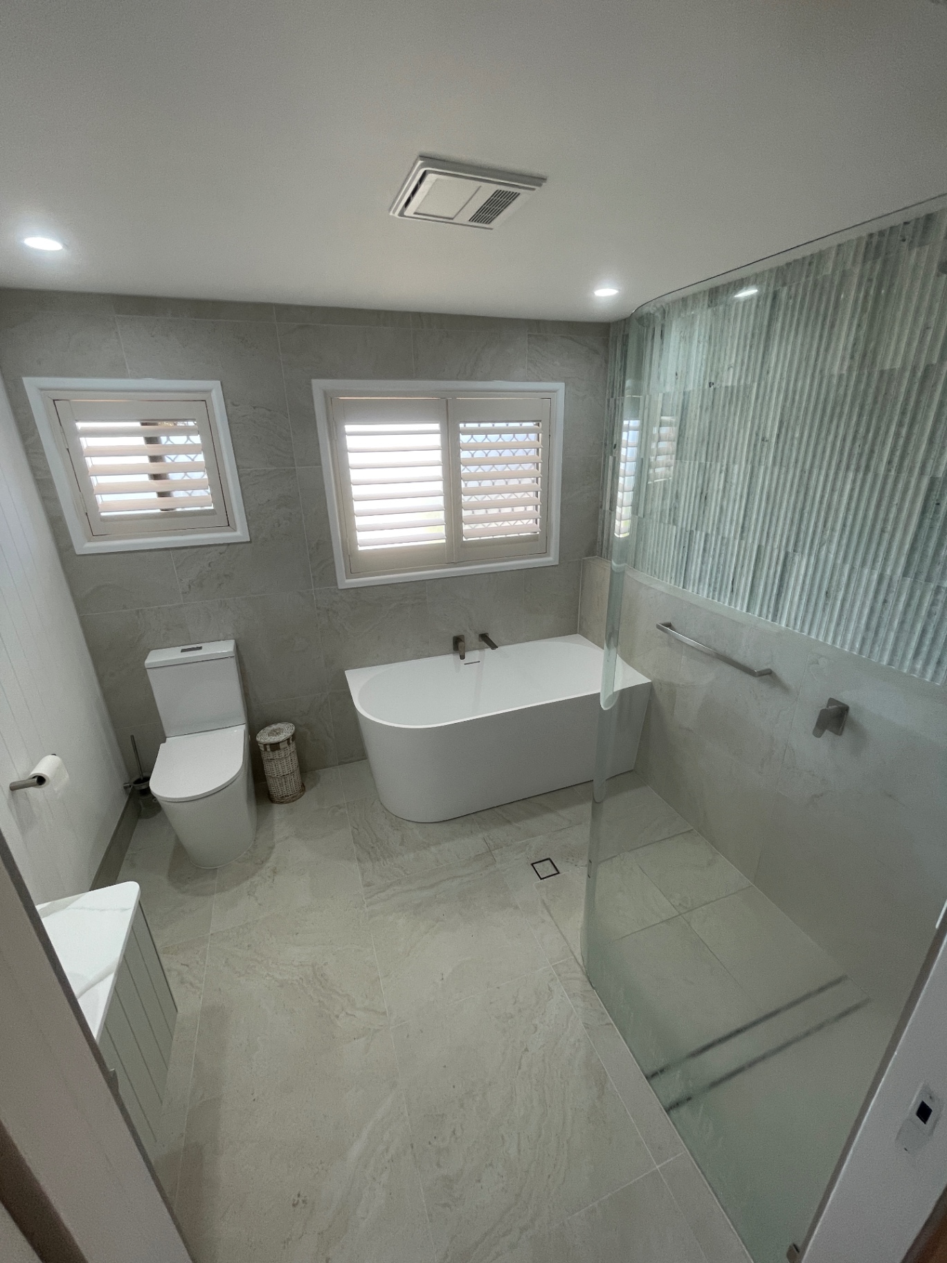 Paired wet-area renovation by Pro Build Bathrooms